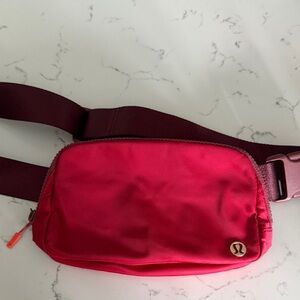 Lululemon dark red and gold belt bag